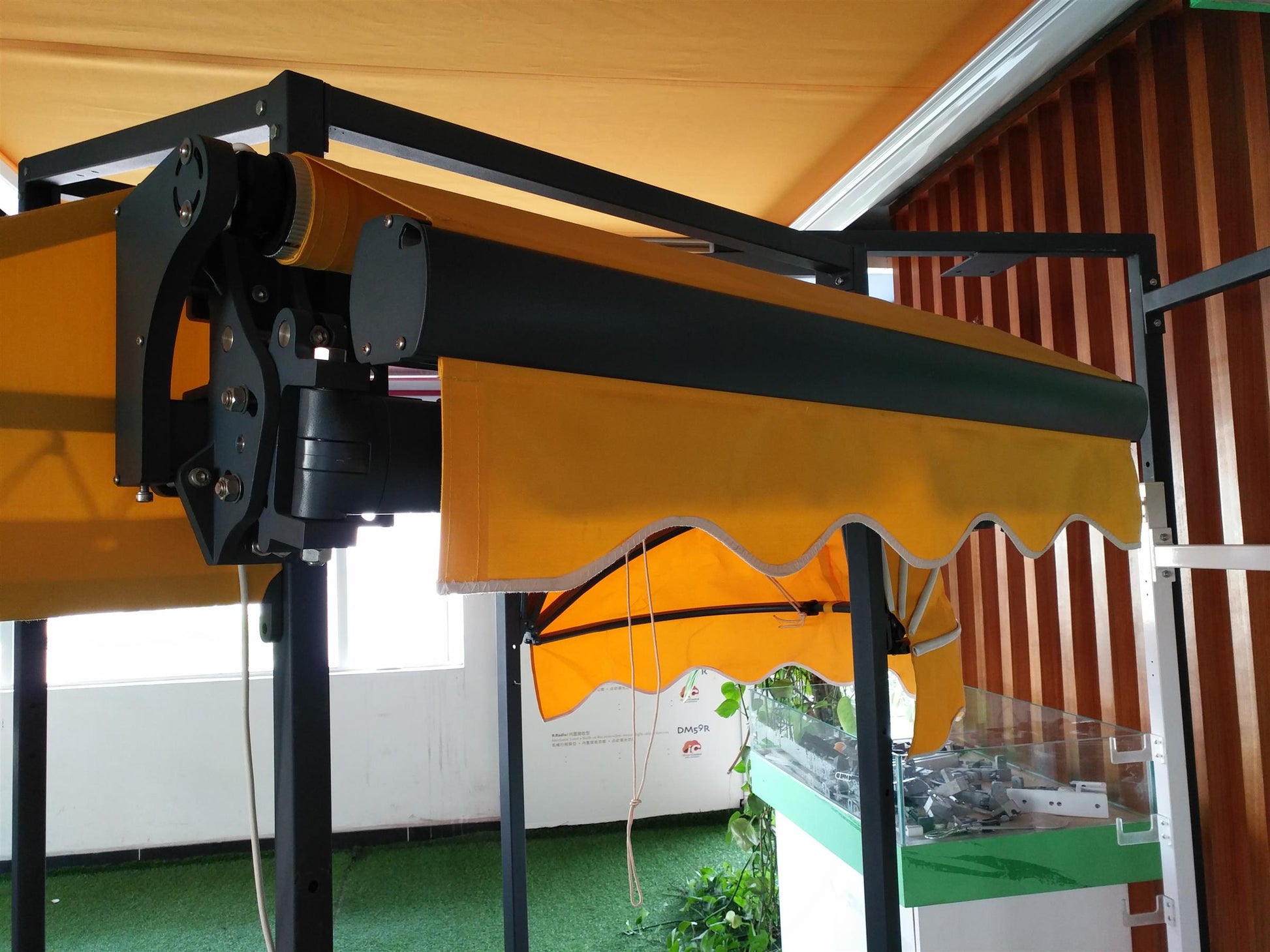 B02 motorized cassette awning frame and side hardware detail