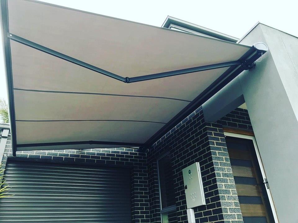 B04 luxury full-cassette awning mounted above a residential patio door