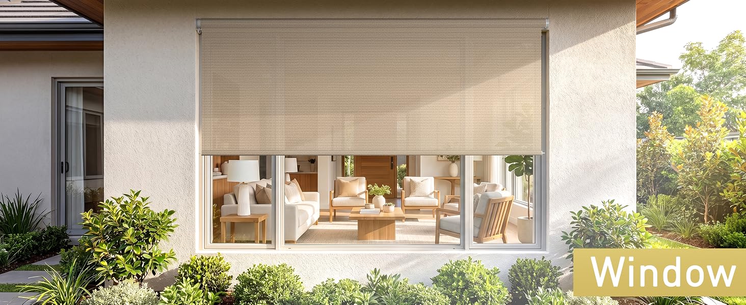 Exterior manual roller shade installed over a large window
