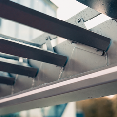 Louvered pergola rainwater management detail