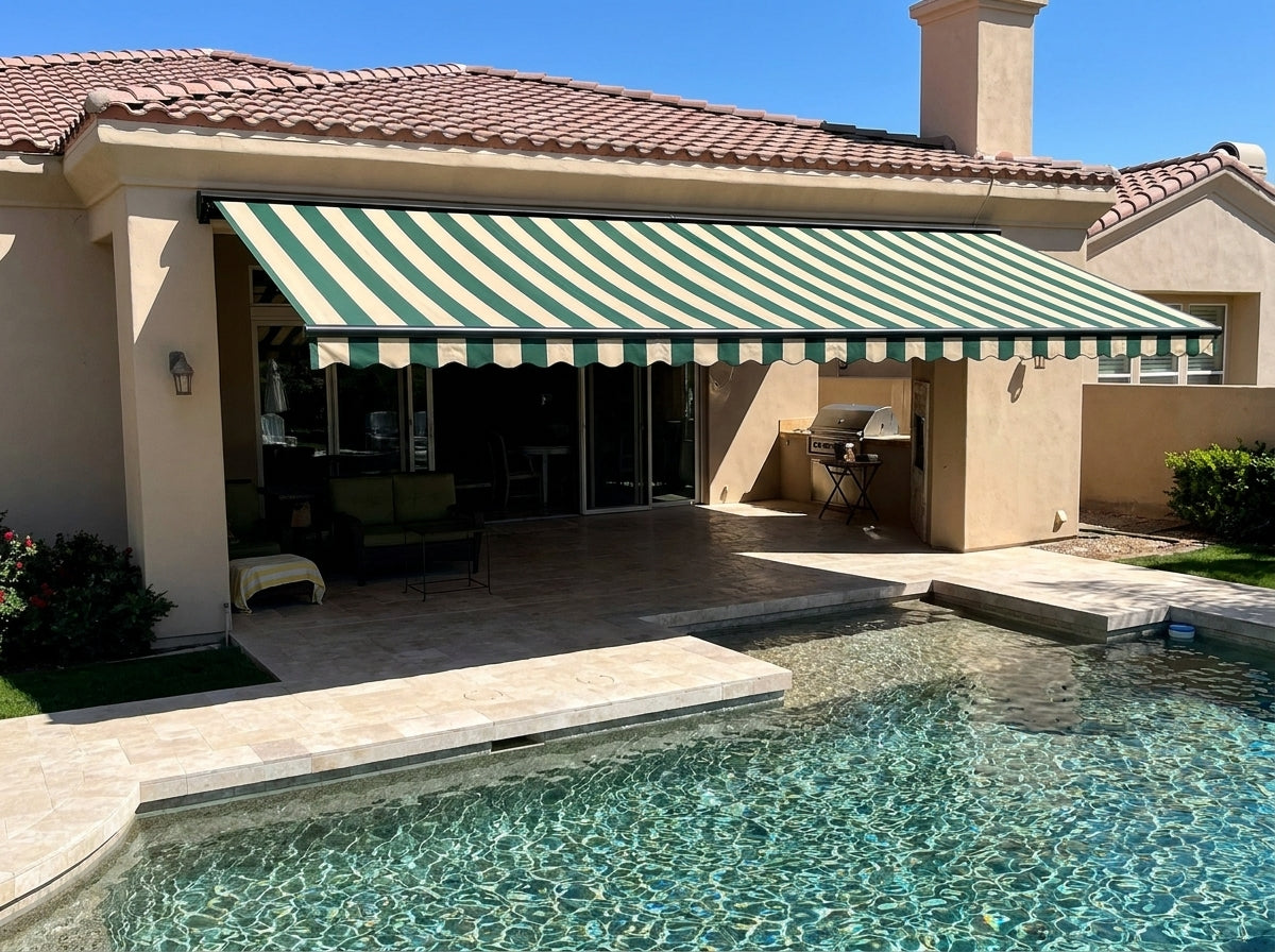 Retractable awning beside a poolside lounge area